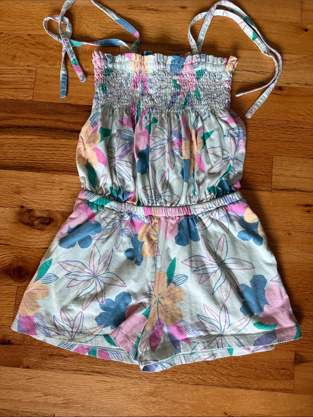 Tea Collection Floral Smocked Romper in Pink, Blue & Yellow